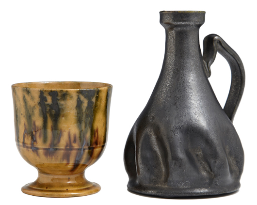 Pottery pieces will include this cup and candlestick by George Ohr and a Newcomb Pottery vase. Crescent City Auction Gallery image.